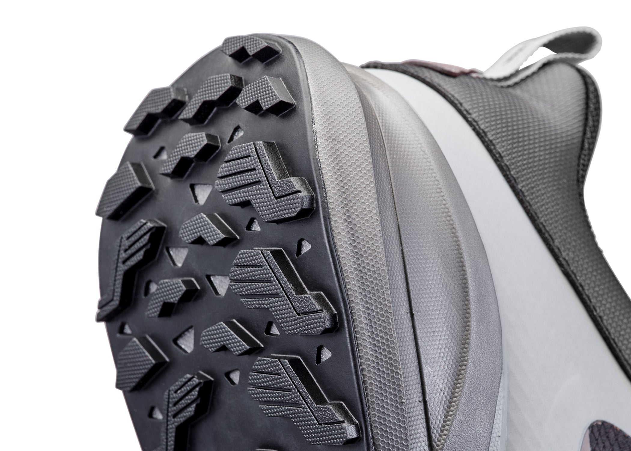 Bottom heel detail of black running shoe.